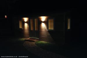 Lodge at night of shed - Laura's Lodge , Somerset