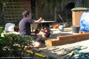 Building the wall of shed - No. 1 Hut, Northamptonshire
