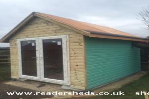 Starting to paint the exterior of shed - Tyddyn Isaf Beach Huts, Isle of Anglesey