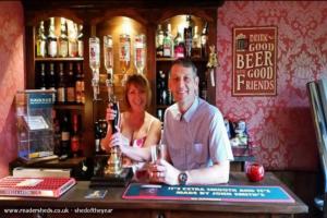 Landlord & landlady behind the bar of shed - The Joiner's Arms, Lincolnshire