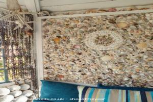 curtain and mosaic detail of shed - The Sea Shell Retreat, Hampshire