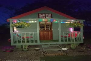 front view with lights of shed - Tiny 1, Cambridgeshire
