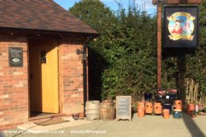 Outside. Pub sign and entrance. of shed - The Duck and Flute, Shropshire