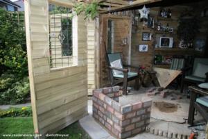 Construction of brick wood burner surround of shed - Love Shack Argentum, Merseyside