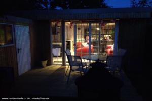 Evening view of shed - Bert and Ernies bar at the bottom of the garden, South Gloucestershire