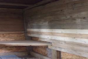 Pallet wood interior of shed - Mini eco-cabin in the woods, Kent