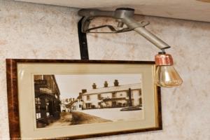 Wall lights are fuel delivery pipe nozzles of shed - Man Cave, Lancashire