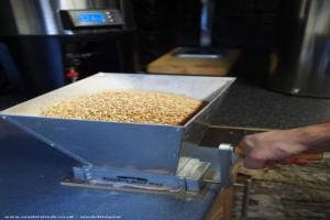 Grain mill through workbench of shed - Beer Jesus' Brew Shed, West Lothian