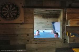 hot tub hatch of shed - The Isolation Hut , Kent