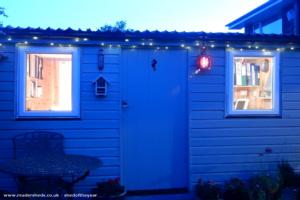 Cabin at night of shed - Coastguard's Cabin, Cheshire West and Chester