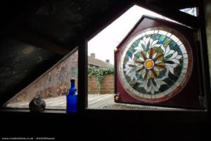 Stained glass door to flat roof of shed - Ellie's Den, Northumberland
