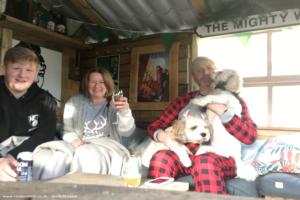 Christmas Day on pallet settee of shed - The Pink Flamingo Tiki Bar, West Midlands