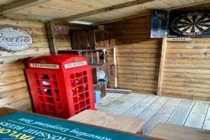 Telephone Box / Wine Rack of shed - The Hairy Lemon, Gloucestershire