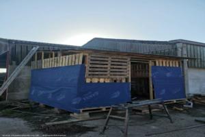 Half way through the cladding of shed - The Pallet Palace, Surrey