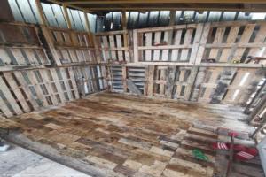 Laying the 'floorboards' (pallet slats) of shed - The Pallet Palace, Surrey