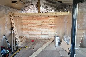 Reclaimed palled boards, sanded to create a feature wall for the bar. of shed - Cheeky monkeys , Nottinghamshire