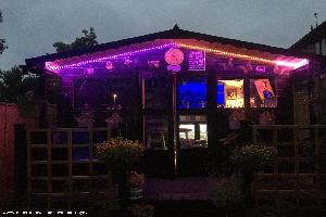Front view at night of shed - The Springfield Tavern , Northamptonshire