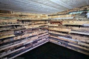 Pallets lining the walls of shed - The Bothy, Telford and Wrekin
