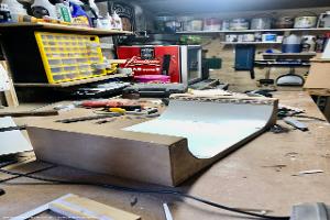 Inside workshop with the fingerboard ramp I made my grandson of shed - Drews Workshop/Studio, Cumbria