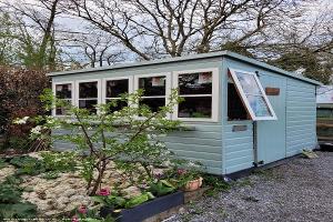 Here's a front view with cherry blossom of shed - Sied Adam , Carmarthenshire