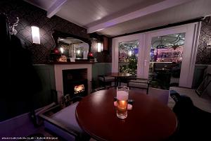 Inside with fire on of shed - The Shooting Star, Greater London