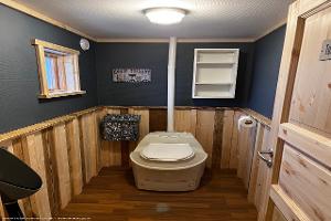 Compost toilet and urinal of shed - The Outhouse Inn, Sweden