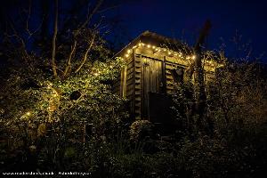 Illuminated at night of shed - Boomhuis, Kent